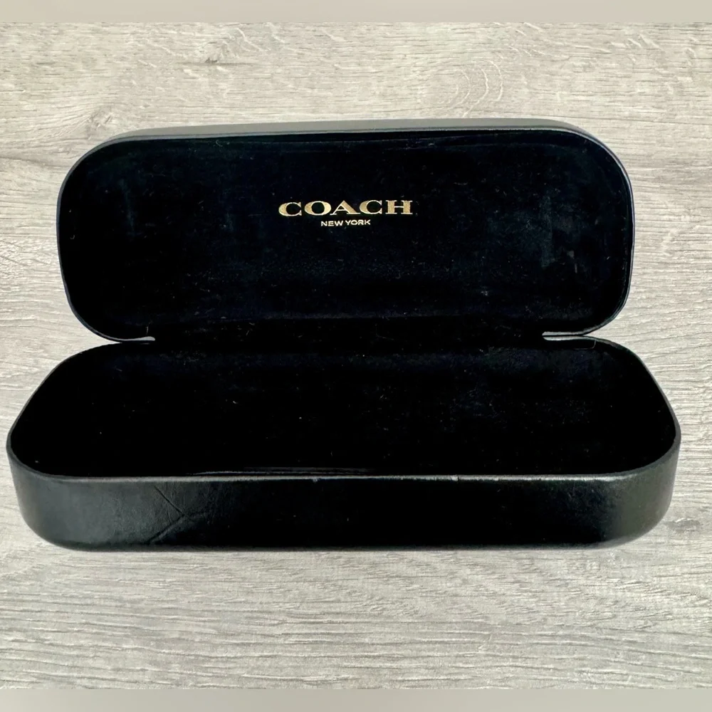 COACH New York Glasses case Black. Used. Has some small dents. See photo.